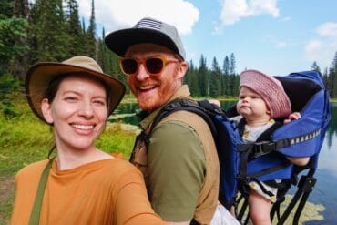 Family hiking near Island Lake Lodge in Fernie, British Columbia